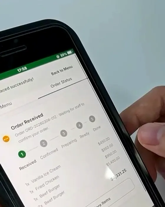 Live order status: Received, confirmed, preparing, ready — guests watch it move.
